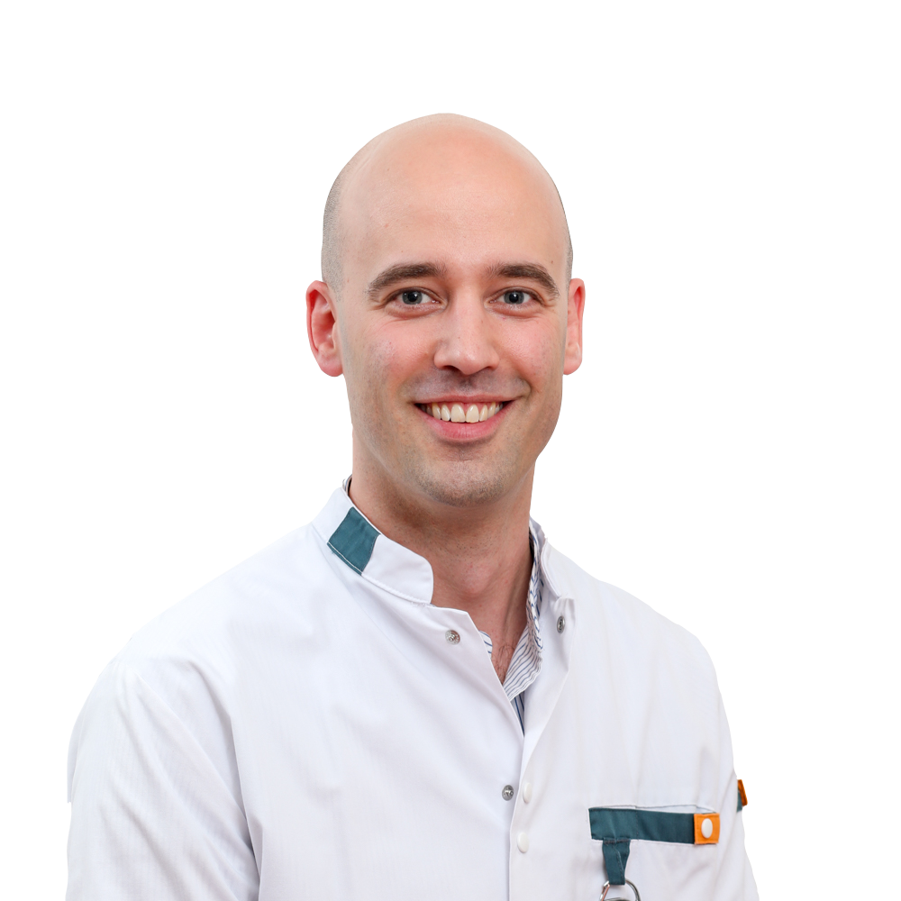 Pasfoto van Drs. T.W.G. (Tom) van de Voort